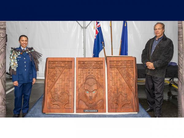 Area Commander Inspector Tracey Thompson and master carver Hermann Salzmann with Uru-Kahika.