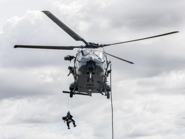 Ice and Senior Constable Luke Dunstan winching from the NH90. Photo: Jane Dunn Photography.