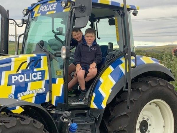 Reid Cathcart and friend in the police tractor.