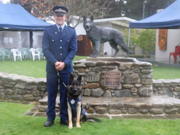 Constable Scott Gosnell with Apex on graduation day.