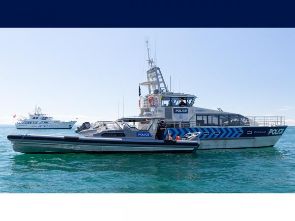 Police 1 (smaller boat) alongside the Auckland police launch Deodar.