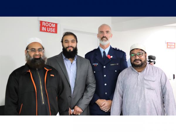 Inspector Grant Tetzlaff with Imam Muhammed Shaakir Ismail and leaders from the Avondale Islamic Centre.