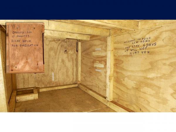 Inside the bunker, with (inset) one of the messages scrawled on the walls for the would-be 'guest'. 