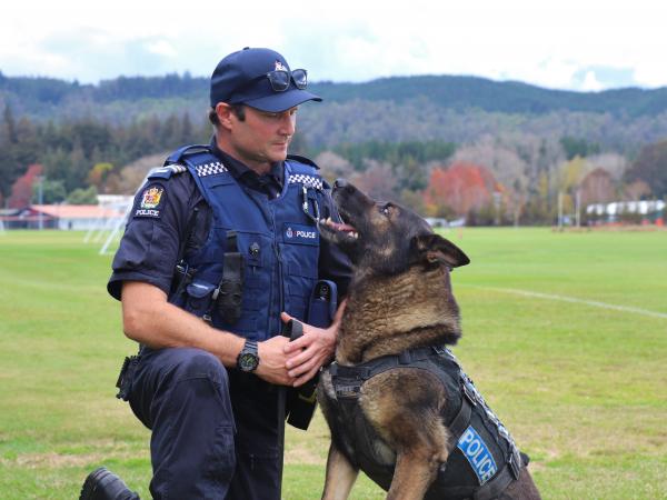 Sergeant Scott Robinson with Duke, who has retired