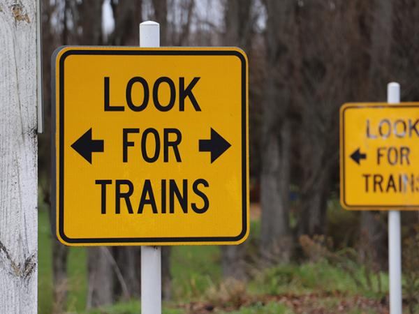 'Look for trains' signs