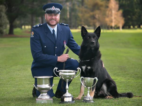 Who's a good boy? Dave and Ice after being named the 2015 national champions. Photo: Senior Constable Fiona Foxall