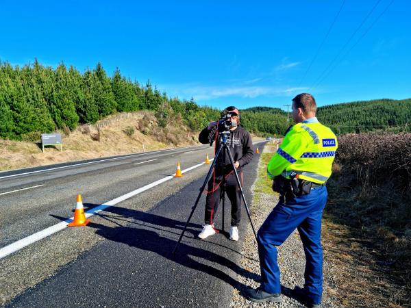 Senior Constable Steven Knox being interviewed by a Hawke's Bay App reporter