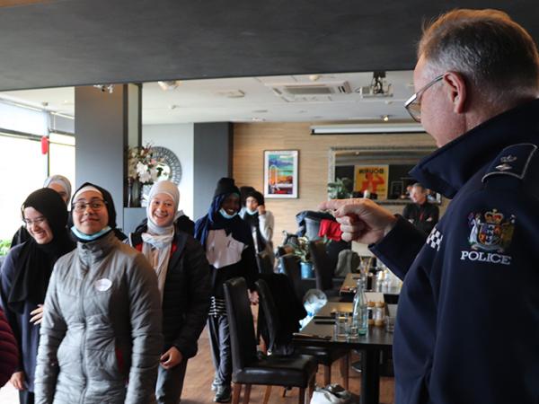 “I want to hear plenty of laughter on this trip!” Southern District Commander Paul Basham shares a laugh with some of the group.