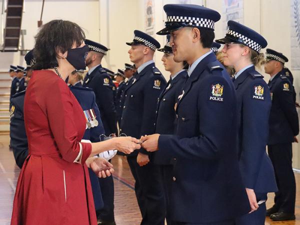 Minister of Police with Constable Joshua Teng.