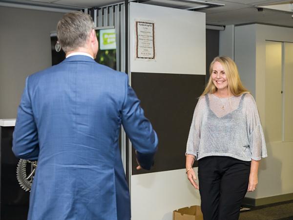 Assistant Commissioner Sandra Venables accepting her award from Commissioner Andrew Coster.