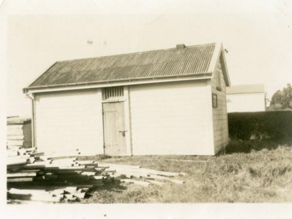 A sepia photo of the old police station on Uxbridge Street.