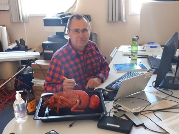 Damian Karena at work...with kaimoana close at hand.