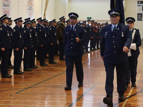 Sergeant Chris Blanchard leads the Colour Party off his final graduation parade. Chris has instructed wings since 2006 and in th