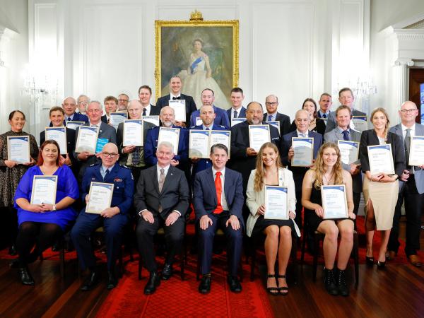 Group photo of the reward recipients with His Excellency Dr Richard Davies.