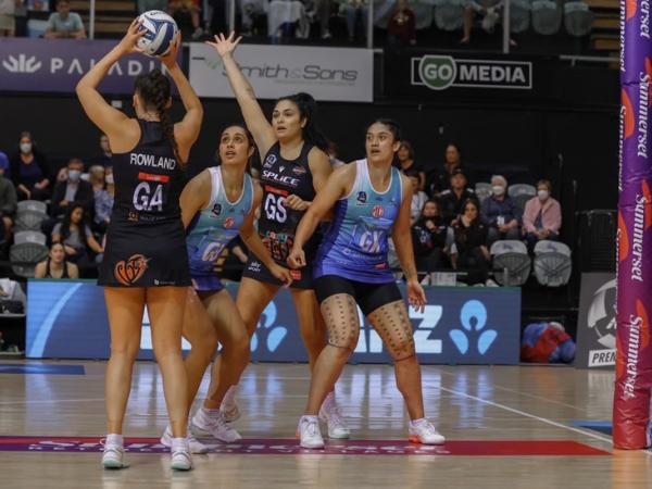 Constable Eseta Autagavaia playing as goal shoot in a game for Magic. Photo credit: Michael Bradley.