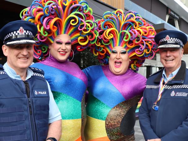Miss Shaniqwa (second from left) and Lady Bubbles (third from left) stole the show - pictured here with Inspector Peter Cooper a