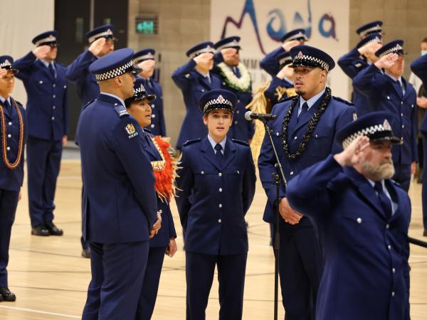 Wing members singing the National Anthem.