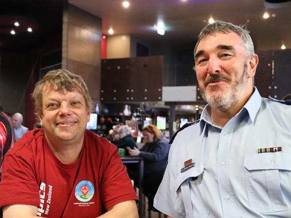 Senior Sergeant Andrzej Kowalczyk with Special Olympics athlete Dion.