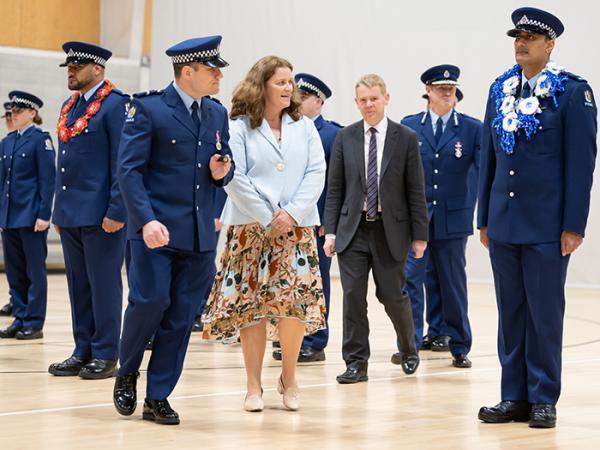 Wing patron Stacey Shortall inspects the wing with Police Minister Chris Hipkins and Commissioner Andrew Coster.