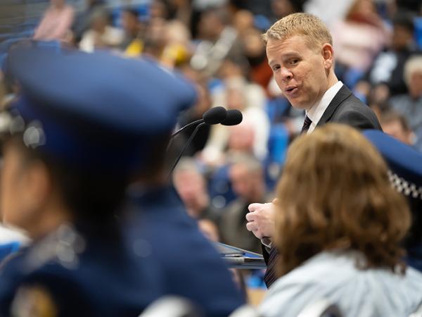 Police Minister Chris Hipkins addresses the new constables during the graduation ceremony.