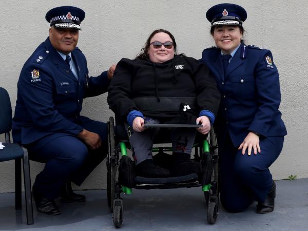 Fund-raiser Natalya Manton with Superintendent Warwick Morehu, Director Training, and Assistant Commissioner Tusha Penny.