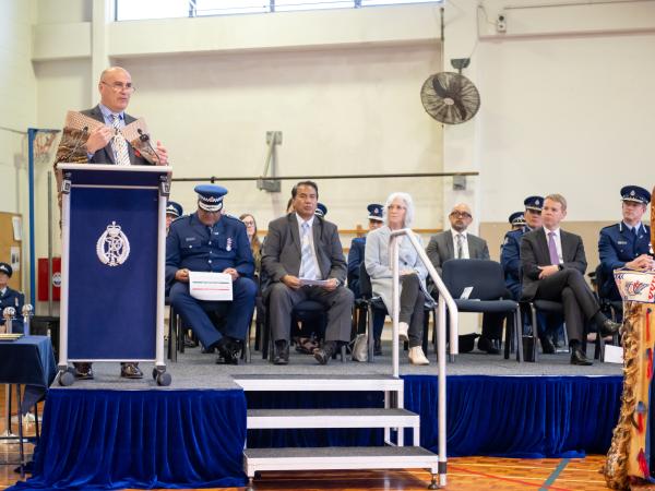 Wing 359 patron Helmut Modlik addresses the graduating constables.