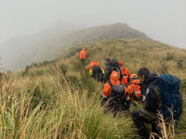 The rescue teams in action during the bad weather. 