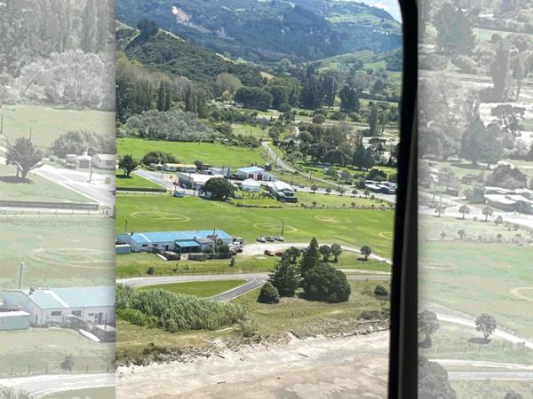 Helipads have been mowed by locals into the sports fields at Tokomaru Bay United Sports Club.