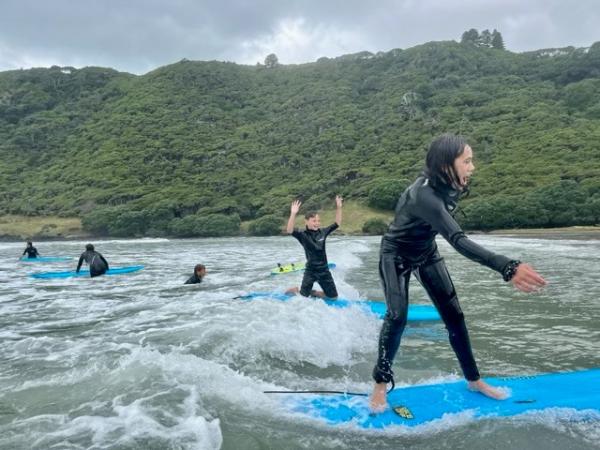 Some of the students surfing.