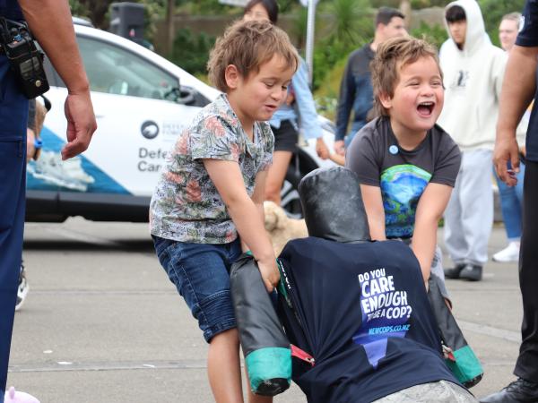 With a bit of teamwork, these determined champions were able to pull a dummy to the finish line.