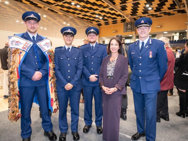 Constables with Police Minister Ginny Andersen and Police Commissioner Andrew Coster.