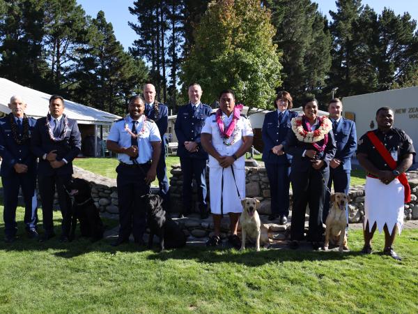 Group shot of the graduating Pacific Detector Dog teams and officials.