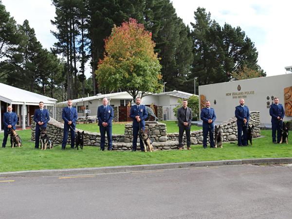 Group shot of the graduating dog teams and their trainers. 