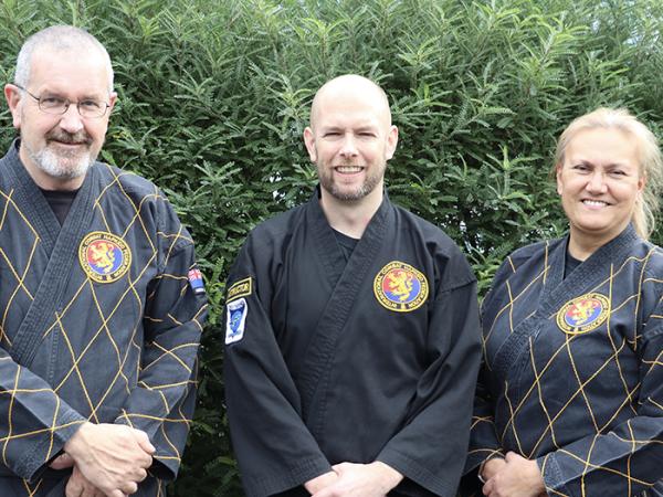 Inspector Nick Thom (centre) with Nevan and Susan Stevenson.