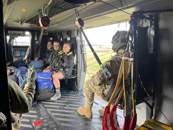 Hawke's Bay Police SAR team prepares to be winched from Air Force NH90.