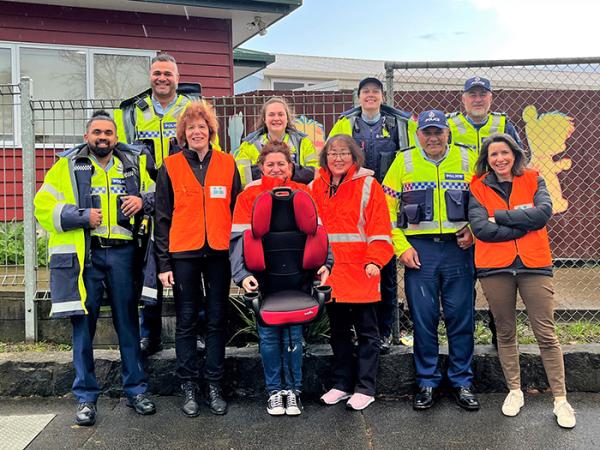 Group shot of some of the Police staff and partners involved in the checkpoint.