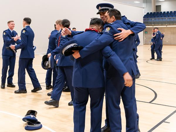 Wingmates hugging
