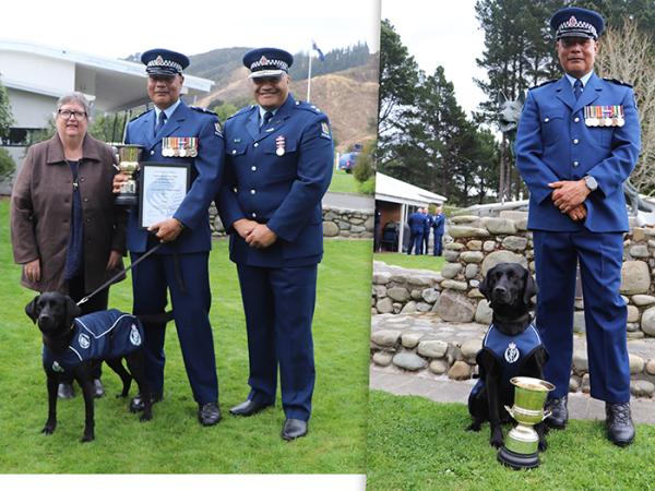Senior Constable Patrick Derbyshire and Ripper holding the trophy next to Alan Syme's daughter Kim.