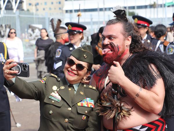 Members of the Ngāti Whātua toa party which led the parade were happy to mingle (in this case with a Colombian delegate).