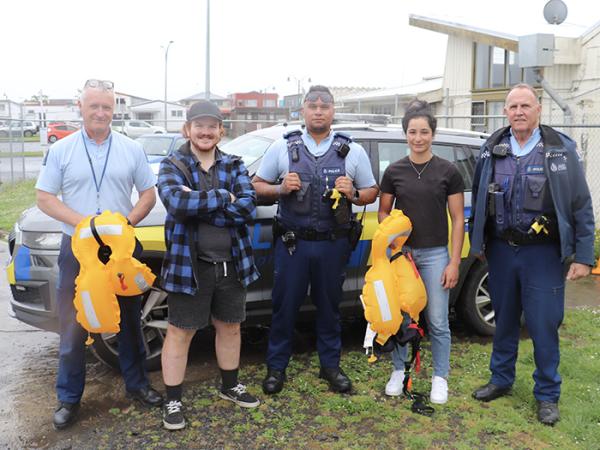 Group photo of, from left: Sergeant Noel Foster, Trent, Constable Nick Nahi, Sky and Senior Constable Sid Kennedy.