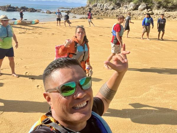 A selfie of some of the staff and participants on a Blue Light Abel Tasman waka adventure.