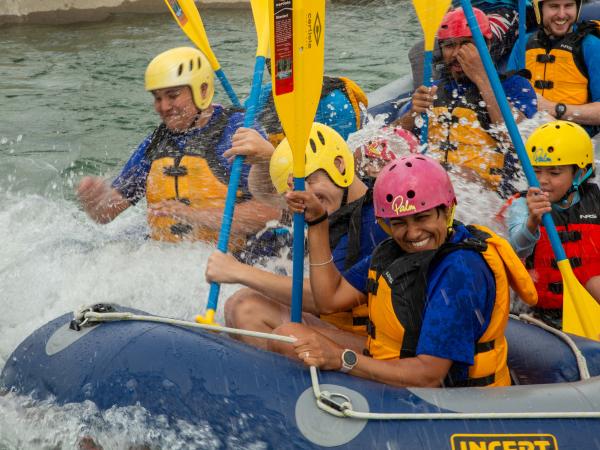 Sergeant Telisha Krishna and crew rafting in choppy waters.