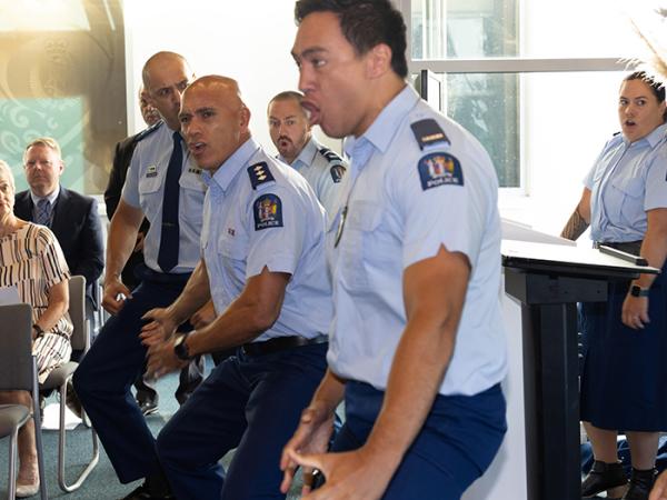 Police staff performing the Police haka. 