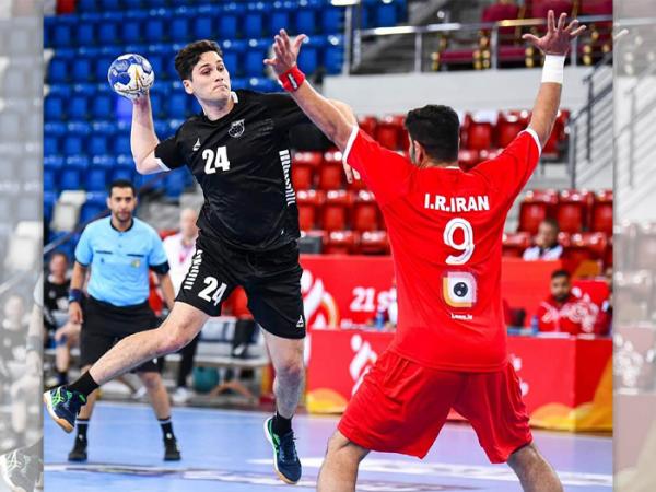 Constable Aston Lang in action for the New Zealand handball team in Bahrain.