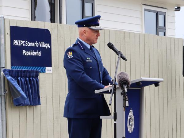 Assistant Commissioner Mike Johnson making a speech.
