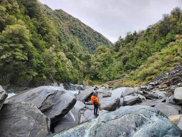 A searcher in one of the many canyons in the area where the man went missing.