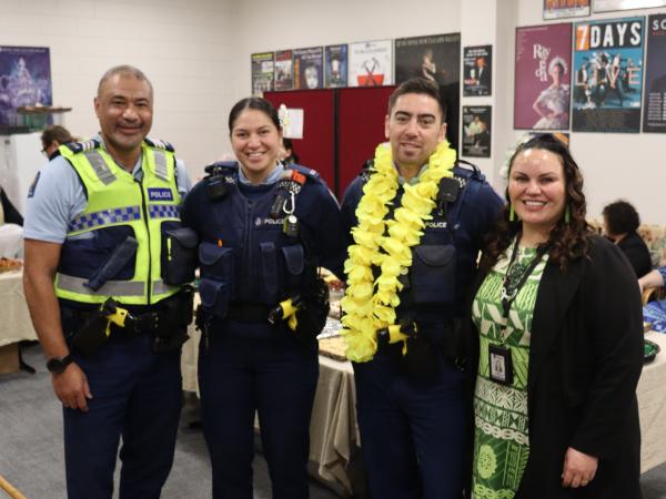 Manawatū staff Sergeant William Mafi and Constables Layce Walker and Rikki Tawhai with Jodie at the Regent Theatre.
