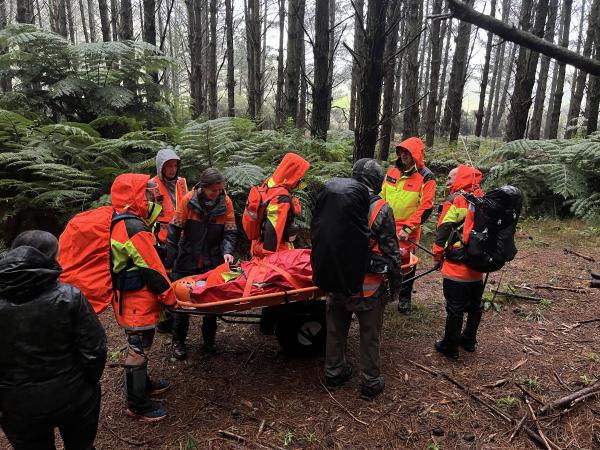 A stretcher carry in the field.