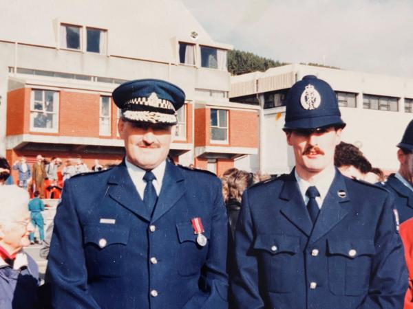 Detective Craig Clare (right) and his uncle Rob Robinson (left), who went on to become the 29th Commissioner of Police.