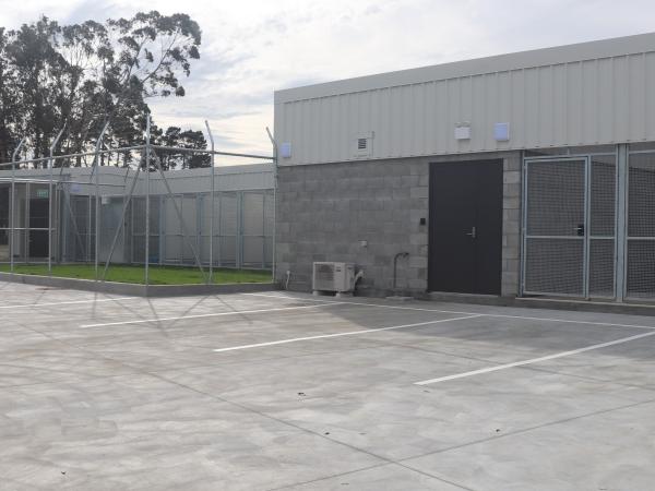 The kennels and garage from outside.